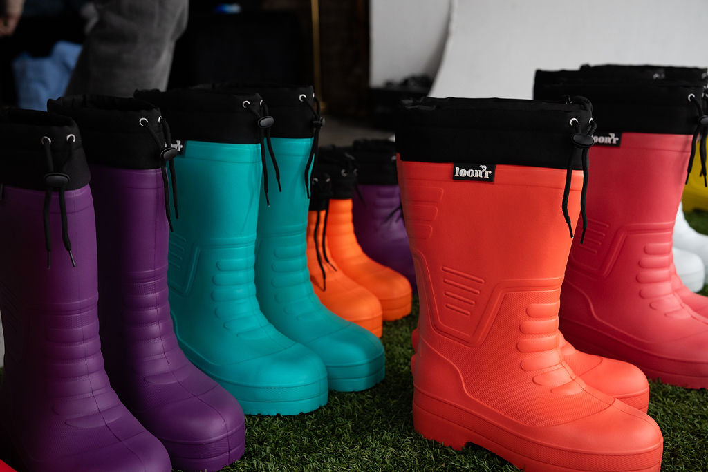 Pair of friends, tailgate at the resort, in Loon'r boots
